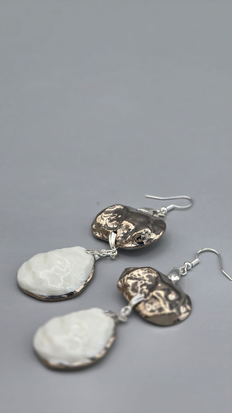 The Platinum Swing Earrings